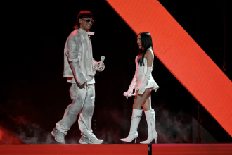 Peso Pluma and Nicki Nicole perform onstage during the 2023 Billboard Latin Music Awards at Watsco Center on October 05, 2023 in Coral Gables, Florida.